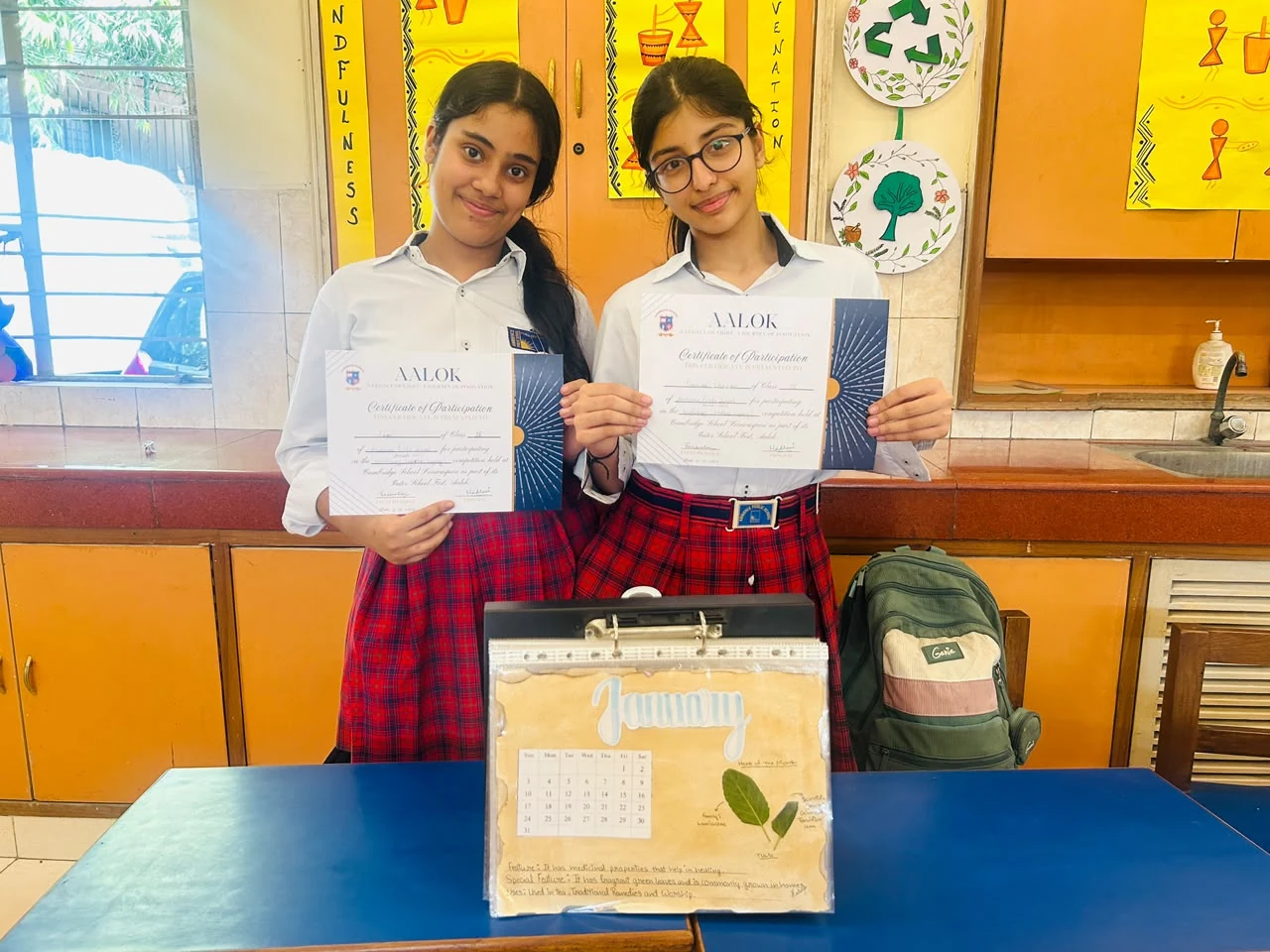 Pranika Sharma and Sanvi with their certificates after securing First Position in Herbal Legacy at Aalok 2.0