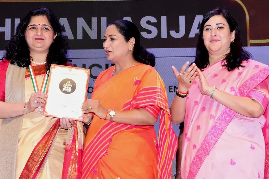 The Principal receives her award
